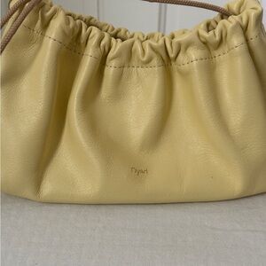Ruched yellow leather bag project dyad